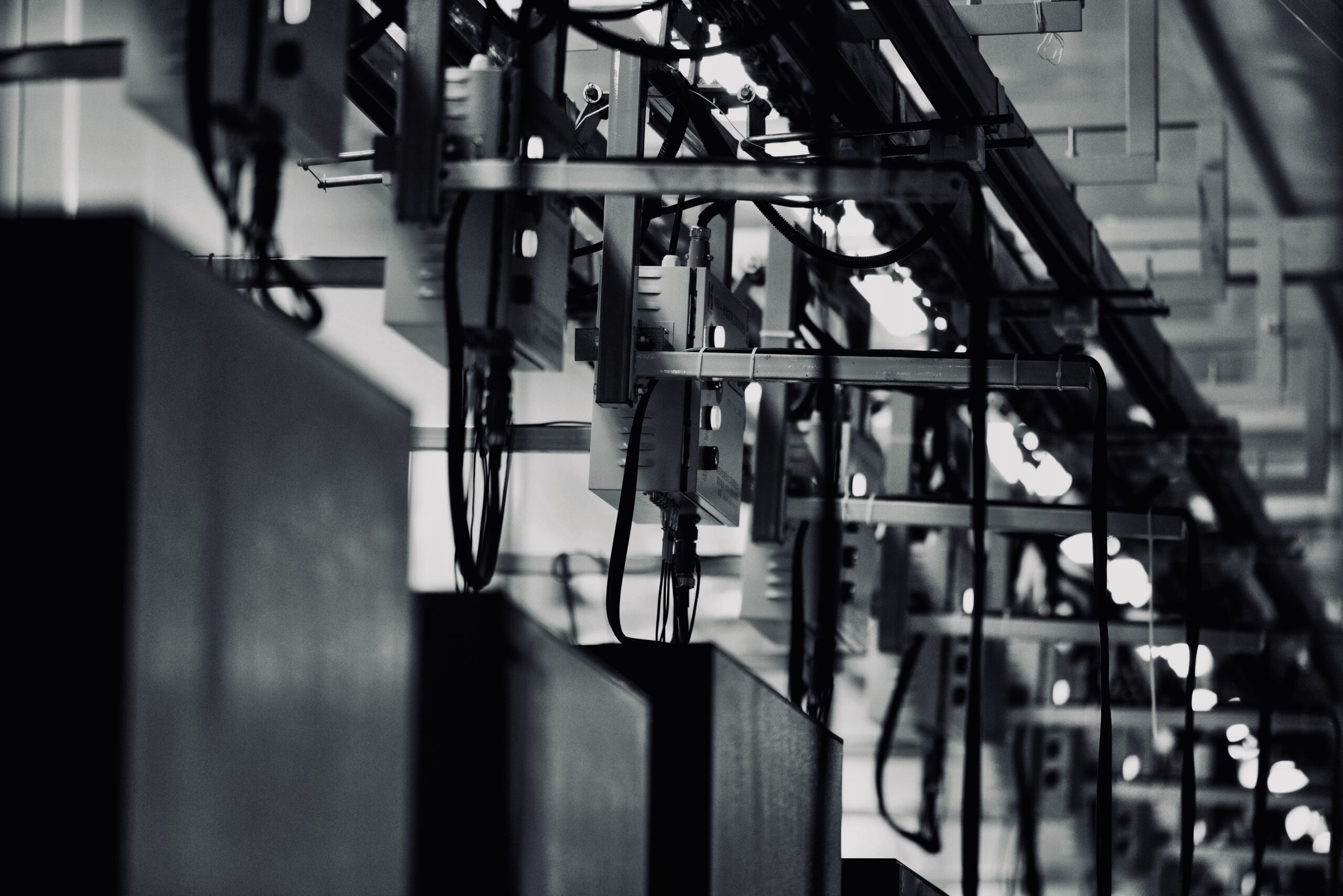 Engineer working with stainless steel industrial equipment